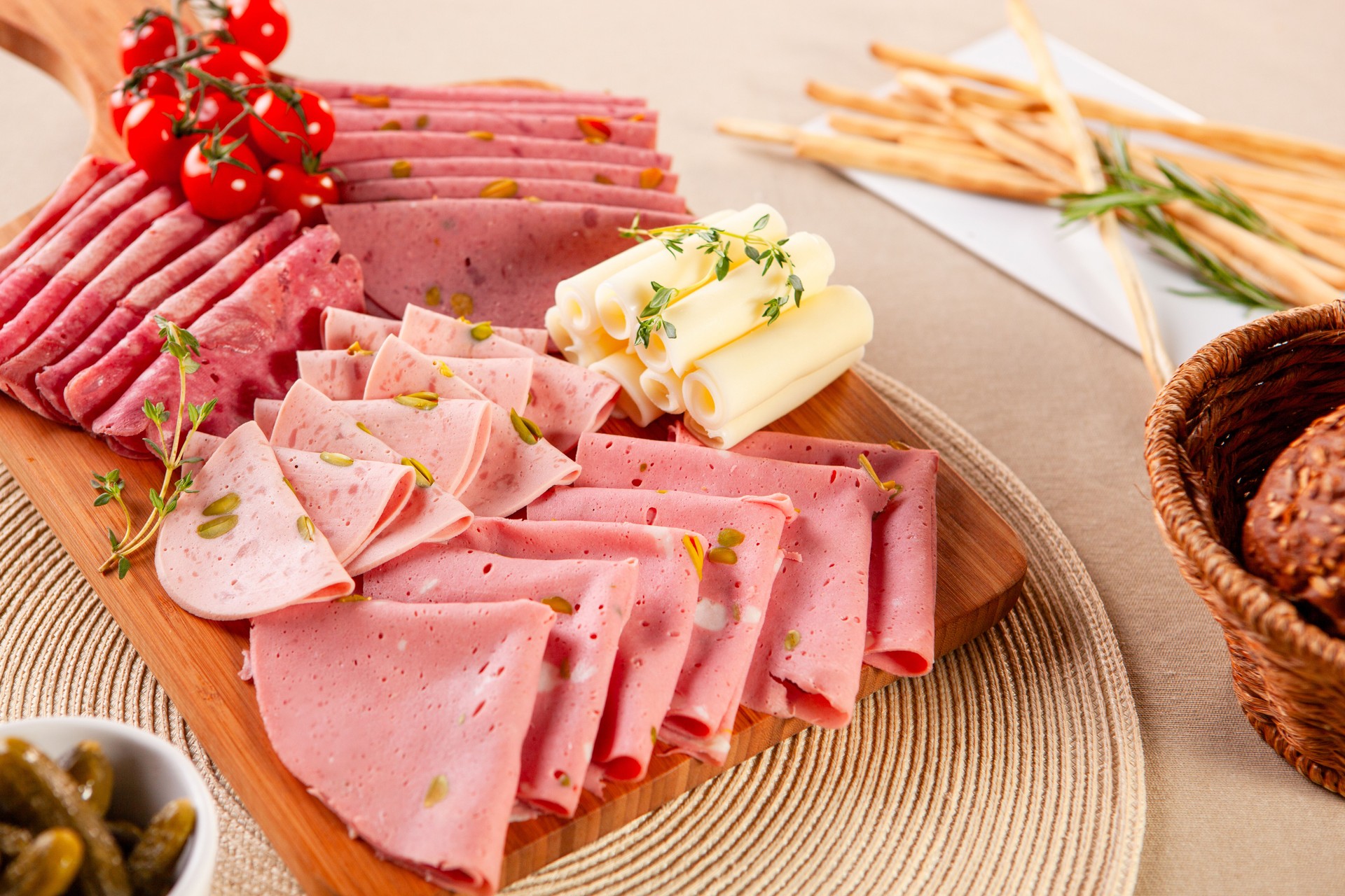 Delicious Appetizer Charcuterie Board with ham, salami, cheese.